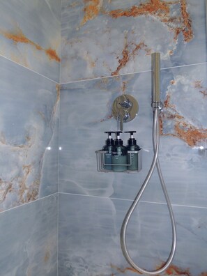 Shower, free toiletries, hair dryer, towels