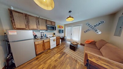 Train Themed Accommodations Near Neosho Square! Both Units/ Sleeps 8