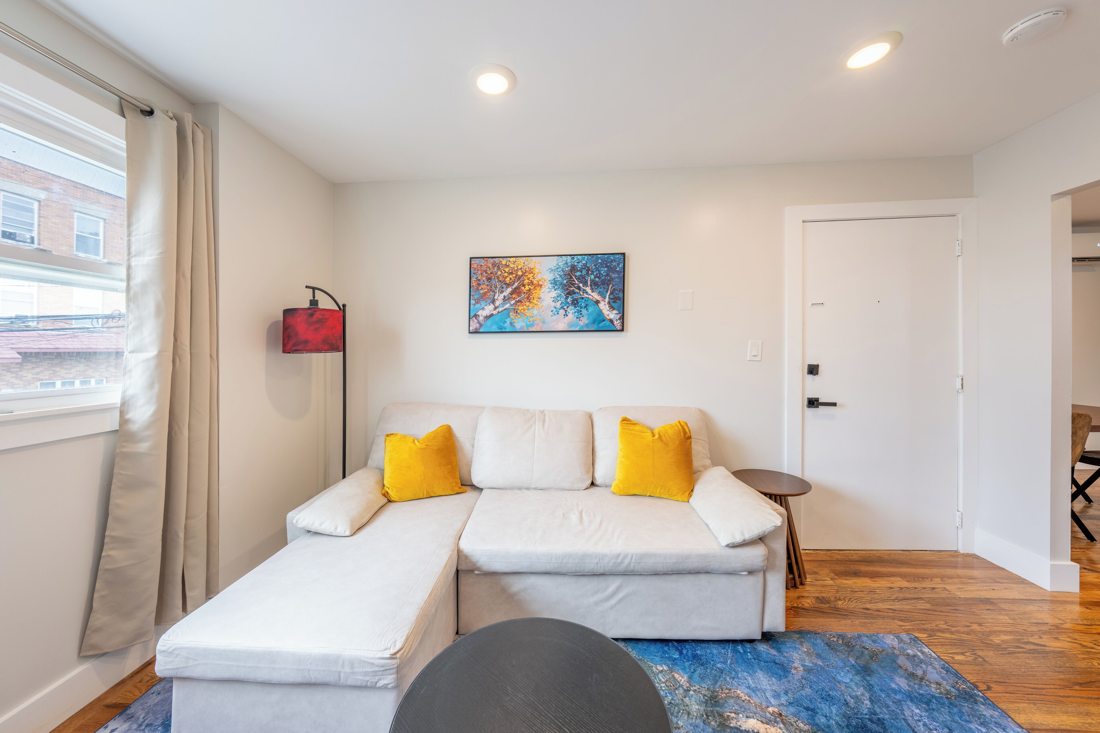 Design Apartment, 2 Bedrooms, Kitchen | Living area | 55-inch LED TV with cable channels