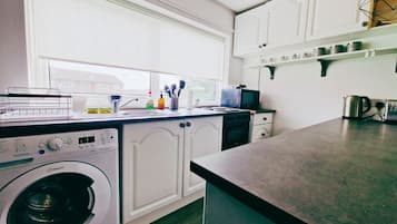 Condo, Private Bathroom | Shared kitchen | Electric kettle, toaster