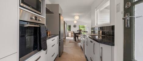 Fridge, microwave, dishwasher, coffee/tea maker