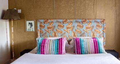 A villa in charming Kilimanjaro Region with swimming pool and views.