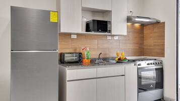 Een magnetron, een oven, een kookplaat