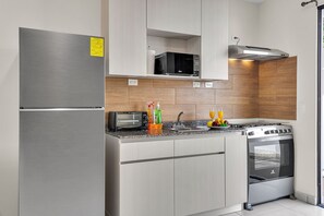 Een magnetron, een oven, een kookplaat