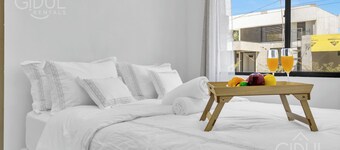 Cozy APT next to the Airport - Wifi, pool, A/C