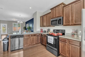 Townhome | Private kitchen | Fridge