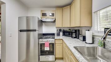 Fridge, microwave, stovetop, coffee/tea maker