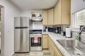 Fridge, microwave, stovetop, coffee/tea maker