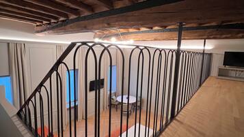 Exclusive Studio Suite, 1 Queen Bed, Non Smoking, City View | Living area | LCD TV