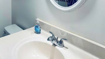 Hair dryer, towels, soap, toilet paper