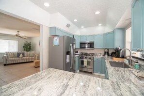 Microwave, oven, stovetop, dishwasher - Space Coast Waterfront Heated Pool Home (Merritt Island)