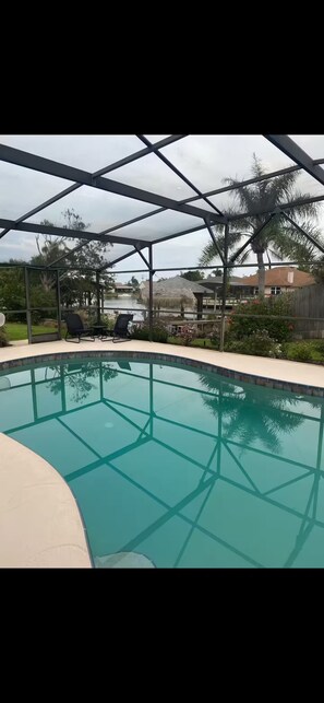 Outdoor pool, a heated pool - Space Coast Waterfront Heated Pool Home (Merritt Island)
