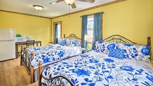 A room with two beds, a ceiling fan, a refrigerator, and a window with curtains. - 2-Hour Drive to Fresh Air Pocono Retreat (Pleasant Mount)