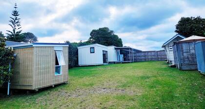 Hosts on the Coast Kowhai Kabins