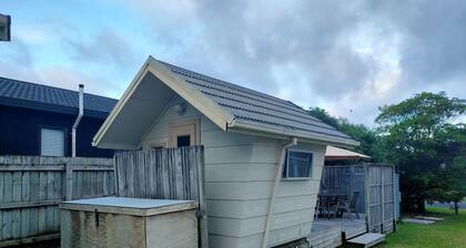 Hosts on the Coast Kowhai Kabins