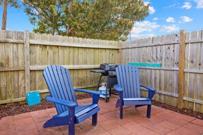 Terrace/patio - RG & Carole's Place: Updated beach cottage with enclosed patio, 2 decks, grill, AC, & W/D (Atlantic Beach)