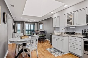 Fridge, microwave, oven, stovetop - Modern waterfront gem with pools, direct beach access, WiFi & balcony (Atlantic Beach)