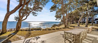 Three dog-friendly, waterfront cottages with full kitchens & private beach