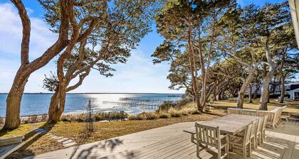 Three dog-friendly, waterfront cottages with full kitchens & private beach