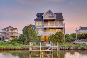 Exterior - Huge, canal-front home w/private hot tub, WiFi, central AC, washer & dryer, dock (Frisco)
