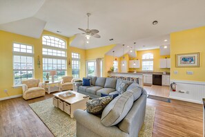 Télévision, cheminée, lecteur de DVD, baby-foot