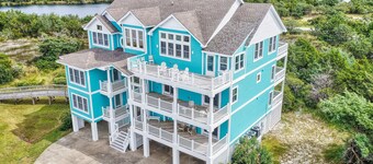 1-acre waterfront oasis with pool, hot tubs & sunrise/set views - dog-friendly
