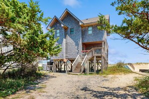 Exterior - Fun beachfront home w/shared pool, WiFi, private washer & dryer, central AC (Avon)