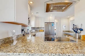 Fridge, microwave, oven, stovetop - Fun beachfront home w/shared pool, WiFi, private washer & dryer, central AC (Avon)