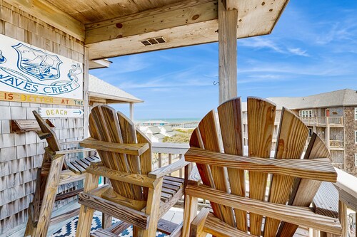 Fun-filled vacation home steps from beach with outdoor pool, AC, W/D, & balcony