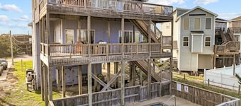 Coastal home with private pool, game room, media lounge, oceanside deck