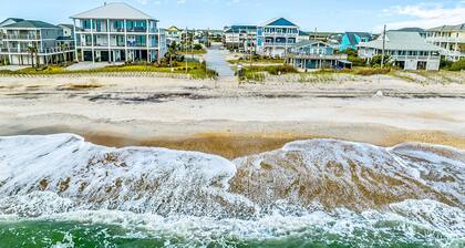 Dreamy ocean-view suite with pool, central AC, full kitchen, patio, & balcony