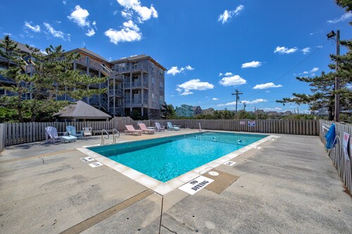 Bright, updated oceanfront home with shared pool, private deck, & great views