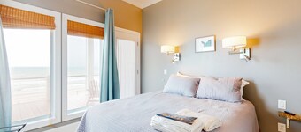 Beachfront home with beach access, private hot tub, pool, elevator, & game room