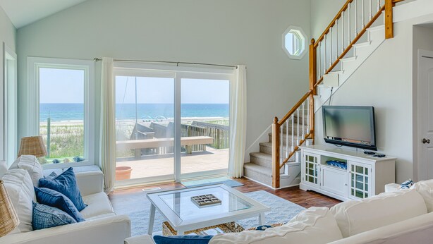 Living area - Oceanfront home with beach access, a game room, washer/dryer, & central AC (Topsail Beach)
