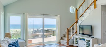 Oceanfront home with beach access, a game room, washer/dryer, & central AC