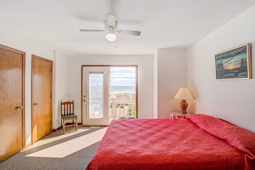 Dog-friendly home with ocean views, beach access, washer/dryer & central AC