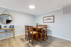 Dining - Dog-friendly, oceanfront condo with shared pool and beach access (Carolina Beach)