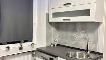 Frigorífic, microones, forn i placa de cuina