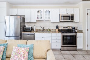 Fridge, microwave, oven, stovetop - 2-story ocean/beach-view home with balcony, washer/dryer & AC - dog-friendly (Kure Beach)