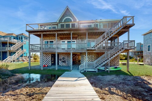 Waterfront home with private hot tub, sound access, fireplace & pool