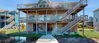 Waterfront home with private hot tub, sound access, fireplace & pool