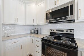 Fridge, microwave, oven, stovetop - Beachfront home with stunning ocean views — Dog-friendly too! (North Topsail Beach)