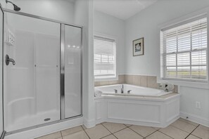 Shower, jetted tub, towels