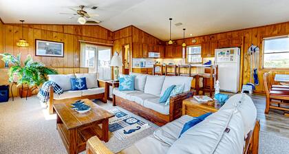 Charming water view home with pool access, decks & outdoor shower - dog-friendly