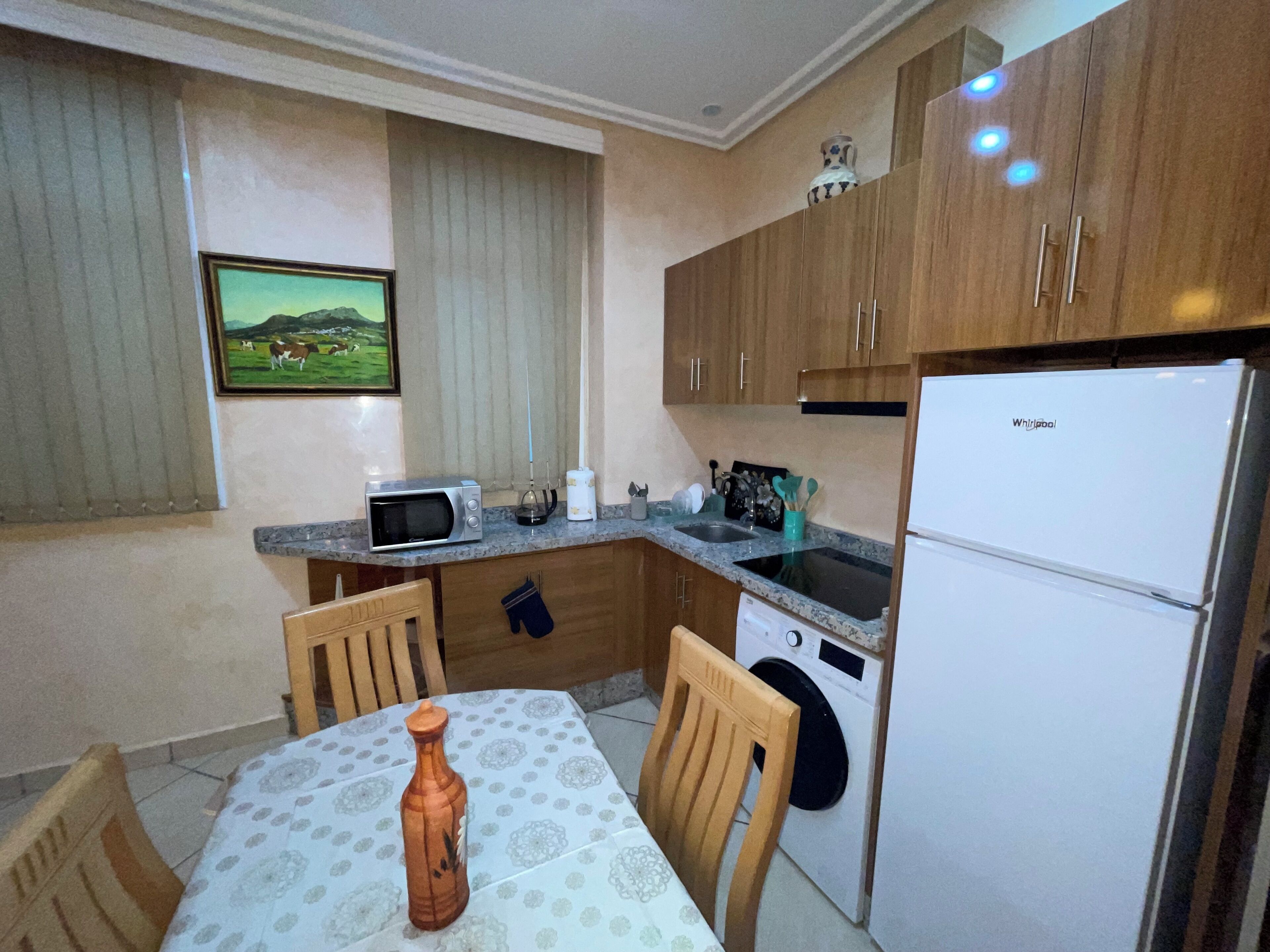 Departamento familiar, patio | Área de sala de estar