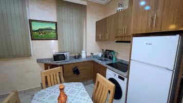 Apartemen Keluarga, patio | Area keluarga
