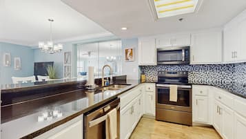 Coffee/tea maker, fridge, microwave, oven