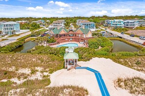 Exterior - Coastal Condo with golf course view and shared pool access (Southport)