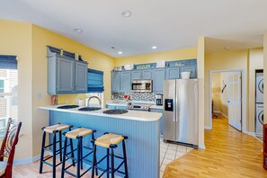 Fridge, microwave, oven, stovetop - Clean condo with golf course & water views - with balcony, central AC, & W/D (Sunset Beach)