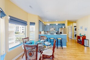 Dining - Clean condo with golf course & water views - with balcony, central AC, & W/D (Sunset Beach)